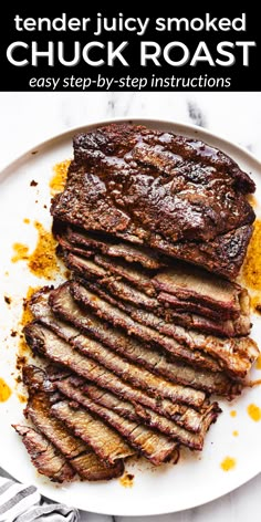 tender juicy smoked chuck roast on a white plate