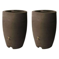 two brown vases sitting side by side on top of each other, with handles