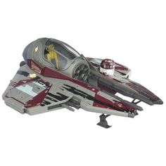 a toy model of a space ship on a white background