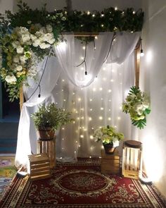 an indoor area decorated with flowers and lights