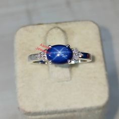 Title :Dainty Lab Star Sapphire Ring, Birthstone Ring ,Blue Star Ring Ring, 925 Silver, Star Sapphire Ring, Engagement Ring, CZ Diamond Ring , Wedding Ring, Gift. Band : Aarohi Jewellers Material : 925 Sterling Silver Blue Star Sapphire Stone Weight :2.70Ct Sapphire Stone Size : 8 x 6 mm Style: Minimalist All of our jewelry is handmade with great care by our team. We carefully inspect all the jewelry after production and before shipping, and make sure you are well taken care of. Customer satisfa Sapphire Star Ring, Star Shaped Sapphire Ring For Anniversary In Sterling Silver, Star-shaped Silver Sapphire Promise Ring, Star Saphire Ring, Star Ring Engagement, Blue Star Saffire Ring, Star-shaped Sapphire Ring As Gift, Star-shaped Sterling Silver Sapphire Ring, Silver Star-shaped Sapphire Ring As Gift