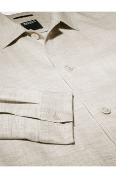 ZEGNA takes a clean-lined, minimalist approach to utility style on this chore jacket crafted of a wool-enriched silk-and-linen blend kissed with stretch. Front button closure Spread collar Long sleeves with button cuffs Front patch pockets Unlined 35% silk, 35% linen, 19% wool, 10% polyamide, 1% elastane Dry clean Made in Italy Men's Designer Clothing Timeless Linen Outerwear With Pockets, Single Breasted Linen Outerwear With Spread Collar, Linen Single Breasted Outerwear With Spread Collar, Linen Single-breasted Outerwear With Spread Collar, Classic Linen Outerwear With Spread Collar, Luxury Linen Workwear Outerwear, Spring Linen Outerwear With Spread Collar, Classic Linen Outerwear With Button Cuffs, Unstructured Collared Linen Outerwear