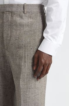 The visibly rich texture of a silk-kissed mélange fabric perfectly complements the comfortable regular-fit cut of these pants polished by pressed creases. A signature V-flap at the back welt pocket instantly yet subtly identifies the brand. 31 1/2" inseam; 24" leg opening; 14 1/2" front rise (size 48 EU) Zip fly with hook-and-bar tab closure Side-seam pockets; back button-welt pocket 62% viscose, 38% silk Dry clean Made in Italy Designer Clothing Fitted Straight Leg Flax Pants, Fitted Flax Color Straight Leg Bottoms, Elegant Fitted Flax-colored Bottoms, Elegant Fitted Flax Bottoms, Tailored Linen Pants With Pressed Crease, Elegant Flax Tapered Leg Pants, Elegant Flax Straight Leg Pants, Elegant Wide Leg Flax Pants, Elegant Straight Leg Flax Pants