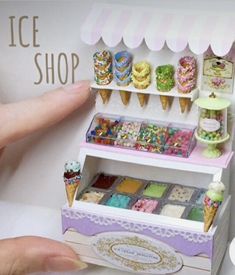 an ice cream shop with lots of different flavored treats