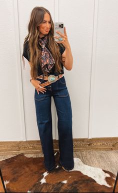 Get that classic western look with our Rancher Button Way High Waisted Denim! Crafted with a flattering high waist and a unique button down design, these jeans are perfect for any cowgirl. Double Waist Band High Waist Vintage Flare Wide Leg western jeans Super soft and stretch denim fabric *Measurements for size 26 Rise: 11 1/2 in Regular Inseam: 33in Fit: Model is wearing 26, true to size. we recommended staying true to size for normal fit. stretch denim Material:100% COTTON Black Jean Western Outfit, Vintage Outfits Western, Western Event Outfit, Western Sports Coat And Jeans, Western Outfits Women Cold Weather, Casual Western Work Outfits, Nfr Day Outfits, Soft Western Outfits, Dark Flared Jeans Outfit