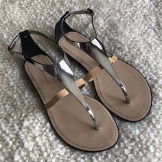 This Is A Brand New Never Worn Bcbg Generation Silver, Black, And Nude Sandals In Size 8. Style Is Bg-Caper. Beautiful Sandals That Can Be Worn To Oh So Many Occasions! Thanks For Looking! Bundle, Stock Up, And Save! 15% Off Two Listings! Sleek Metallic Sandals For Summer, Chic Metallic Sandals For Summer, Chic Metallic Synthetic Sandals, Sleek Silver Sandals For Summer, Silver Open Toe Sleek Sandals, Sleek Silver Open Toe Sandals, Chic Silver Sandals For Beach, Chic Silver Flat Sandals, Size 8 Style