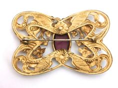 Gorgeous Antique Art Nouveau Gilted Brooch Large Amethyst Stone Center Art Nouveau Gold Brooch With Cabochon, Victorian Gold Brooches With Jewels, Antique Gold Brooches With Jewels, Ornate Gold Brooches With Jewels, Victorian Jeweled Gold Brooches, Ornate Jeweled Gold Brooches, Ornate Gold Jeweled Brooches, Gold Cabochon Brooches For Jewelry Making, Hat Ornament