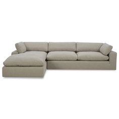 a large sectional couch sitting on top of a white floor