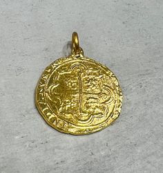 Large Atocha Coin Pendant in 24K Solid Gold. Pure Solid Gold . We are inspired by the Historic Atocha coin and designed our pendant in pure 24K solid gold.(.999 pure) 1.25 Inches/ 30mm in Diameter and approximately one full ounce of 24K Gold- Approximately 31 Grams of Gold. Nuestra Señora de Atocha  was a Spanish treasure galleon that sank in a hurricane near the Florida Keys in 1622.  At the time of her sinking, Atocha was heavily loaded with silver, gold,  gems and other treasures  bound for S Traditional Gold Coin Pendant Jewelry, Traditional Gold Coin Necklace Gift, Traditional Gold Coin Necklace As Gift, Traditional Handmade Gold Coin Necklace, Handmade Gold Coin Necklace With Round Pendant, Traditional Gold Coin Jewelry, Ceremonial Gold Coin Necklace, Ceremonial Gold Coin Necklaces, Traditional Gold Coin Necklace With Round Pendant