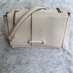 A New Day Faux Leather Pearl Shoulder Handbag. Nwt. There Is A Small Mark On The Front, Shown In Last Photo. The Tag Is White But Is Actually A Cream Color Magnetic Closure Back Pocket Inner Zip Pocket Snap Buttons On The Side Approximate Dimensions: 10”W X 6”H X 4.25”D Will Ship The Same/ Next Day M-F. Chic White Box Bag With Large Capacity, Chic White Large Capacity Box Bag, White Leather Shoulder Bag With Magnetic Closure, White Large Capacity Satchel For Formal Occasions, Chic Cream Square Box Bag, Elegant Shoulder Bag With Adjustable Strap For Day Out, Elegant Leather Shoulder Bag For Day Out, Formal White Satchel With Large Capacity, White Rectangular Shoulder Bag With Magnetic Closure