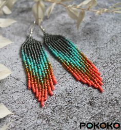 "These turquoise coral beaded earrings pair amazingly with any outfit, dressy or casual. They will emphasize your individuality and compliment your personality on various occasions. Perfect for looking pulled together and on trend. They are made of high-quality Czech colored beads with sterling silver hooks and silicone plugs. Colors: shining gray, turquoise, gold, coral. Length: 4 inches (10.5 cm) Width: 0.8 inches (2 cm) Materials:     Czech \"Preciosa\" beads     Durable synthetic thread     Sterling silver ear hooks     Silicone plugs If you are on the hunt for a gift that will show your significant other some love, these picks are a great solution to surprise and delight. I hope you can find everything here that you were looking for. If you have any questions related to earrings desig Wearable Crafts, Native Necklace, Red Bead Earrings, Beading Designs, Turquoise Bead Earrings, Beige Earrings, Blue Beaded Earrings, Animal Print Earrings, Beadwork Earrings