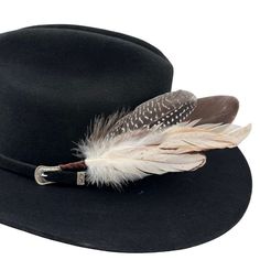 The Cheyenne hat feather is hand constructed with a brown and cream feathers for a natural hat accent. Tuck into the band of any hat. Hat not included. Country Style Brown Hat With Feathers, Cowboy Hat With Feather, Feathered Cowboy Hat Band, Brown Feathered Country Hat, Western-themed Felt Hat With Feathers And Flat Brim, Western-themed Fedora With Feather Trim, Hat With Feather, Colorful Hat, Rooster Feathers