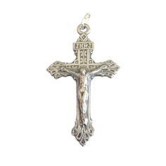 "This silver color Pardon Crucifix pendant has ornate decoration on the front and above the cruciform figure the sign \"JNRJ\" (Jesus of Nazareth, King of the Jews). On the back is the Sacred Heart of Jesus image with two inscriptions in French: \"Father, forgive them.\" and \"Behold this heart which has so loved men.\" Great as a pendant for a Catholic jewelry necklace, rosary crucifix or give as a gift. Made of oxidized silver base metal. Measures approx 1-7/8\" long (without the jump ring) x Catholic Jewelry Necklace, Father Forgive Them, Jesus Of Nazareth, The Sacred Heart Of Jesus, Catholic Necklace, The Sacred Heart, Sacred Heart Of Jesus, Types Of Gifts, Catholic Rosary