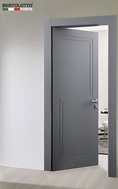 an open gray door in a white room