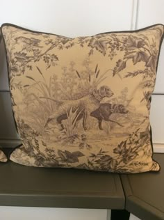 a decorative pillow with an image of a dog on it