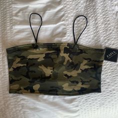 Zaful Camo Cropped Camisole Tank Size Xl Nwt Tag Is Attached But Top’s Material Seems Like It Has Pilling. It Was Purchased This Way. Add Free To Any Bundle. Tags: Camo, Camouflage, Crop Top, Bralette, Camisole, Soft, Tank Top, Summer, Spring, Winter, Fall, Casual, Everyday Wear, Comfy, Lounge Wear, Stretchy, New With Tags Please Ask If You Have Any Questions! Smoke Free Home! Ships Same Day Or The Next Day As Purchased! I Accept Most Offers! Bundle Items T O Get A Better Deal! All Sales Help Me Khaki Military Style Summer Top, Military Style Khaki Top For Summer, Fitted Camouflage Sleeveless Top, Fitted Sleeveless Camouflage Top, Sleeveless Camouflage Cotton Top, Casual Camouflage Sleeveless Top, Casual Camouflage Tank Top For Summer, Sleeveless Camouflage Top For Spring, Summer Military Camouflage Tops