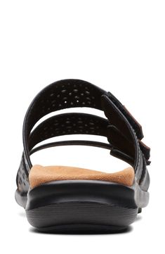 Laser-cut straps keep air flowing through this adjustable leather sandal featuring antimicrobial lining and a targeted contour-cushion footbed, Flat sole Leather upper and lining/rubber sole Imported Adjustable Black Leather Slides, Leather Sport Sandals With Arch Support, Leather Sandals With Gel Cushioning For Beach, Leather Beach Sandals With Gel Cushioning, Adjustable Black Footbed Sandals With Arch Support, Black Leather Slides With Arch Support, Black Leather Sandals With Arch Support, Laser Cut Leather, Slip On Sandals