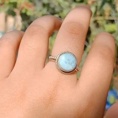 Handmade Larimar bohemian ring , you can wear this ring as a party wear ring .. Title - Larimar stone ring Stone color - Blue Stone shape - Round Material - Sterling silver 925 Note - We use natural gemstones, so color shade may be little bit different .. we are giving you best quality rings on best price .. contact us for more quantity Bohemian Opal Birthstone Ring, Bohemian Sterling Silver Opal Birthstone Ring, Bohemian Sterling Silver Stackable Rings With Birthstone, Bohemian Sterling Silver Crystal Birthstone Ring, Bohemian Sterling Silver Opal Promise Ring, Bohemian Sterling Silver Open Opal Ring, Bohemian Larimar Ring As A Gift, Bohemian Sterling Silver Midi Rings For Anniversary, Handmade Turquoise Promise Ring