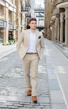 Luxury Beige Three-piece Suit For Groom, Luxury Cream Suit For Spring, Mens Tan Suits For Wedding, Luxury Beige Suit With Pockets, Mens Navy Pants Cream Jacket Wedding, Luxury Beige Suits With Pockets, Luxury Fitted Suits In Neutral Color, Chic Luxury Beige Suit, Linen Groomsmen Attire Champagne Dress