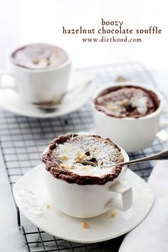 two white cups filled with hot chocolate souffle