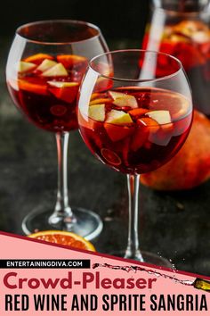 two wine glasses filled with red wine and sprite sangria