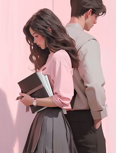 a man and woman standing next to each other in front of a pink wall holding books