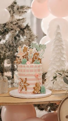 a gingerbread decorated cake sitting on top of a table