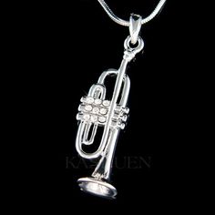 PERFECT GIFT FOR MUSIC FANS, INSTRUCTOR, TEACHER OR STUDENT!!You are getting a Classy, 3D TRUMPET Pendant with Swarovski crystals. It comes with a FREE 18" inch (45cm) Original Rhodium Plated Snake Chain necklace with lobster clasp. Pendant size is 1/2"(1.30cm) wide X 1 5/8" (4.20cm) high.Crystal Color: Crystal Clear===================Prices are in US$.For shipping policies and other important information, click on “profile” on the right.See an item that you like but has already been sold? Conta Best Friend Christmas Gift, Brass Music, Percussion Music, Trumpet Music, Small Fringe, Best Friend Christmas, Rustic Necklace, Band Nerd, Wedding Studs