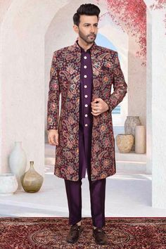 This Mens Sherwani features a multi-color thread embroidery and sequin work, creating a stunning open jacket design. With its traditional yet modern appeal, this sherwani is perfect for weddings and formal occasions. Elevate your style with this expertly crafted piece. Traditional Wear With Zari Work For Winter Reception, Winter Bandhgala With Zari Work For Reception, Traditional Drape Purple Kurta With Dabka, Traditional Winter Kurta For Reception, Winter Sherwani For Reception With Long Sleeves, Winter Sherwani With Long Sleeves For Reception, Long Sleeve Sherwani For Reception In Winter, Winter Long Sleeve Sherwani For Reception, Fitted Multicolor Nehru Jacket With Zari Work