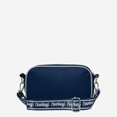 At the game. In the crowd. On the go. You've got team spirit in the bag (along with the rest of your stuff) with this Dallas Cowboys Team Stripe Crossbody Bag. Features All-over team-colored design that makes carrying your stuff to the game a breeze Bold team logo display, in case there were any doubts where your allegiances lie Woven, team-colored crossbody strap that makes carrying the team easy and convenient Repeat script team name display on strap for a little extra team spirit Full-zip clo Sporty Bags For Football Season, Sporty Rectangular Game Day Bag, Sporty Rectangular Shoulder Bag For Sports Events, Functional Rectangular College Bags, Functional Rectangular College Bag, Logo Display, In The Bag, Team Names, Dallas Cowboys