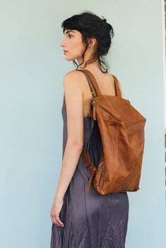 This stunning backpack is made of genuine soft nappa leather in a Honey Brown color. With enough room for all your daily essentials, It is perfect for everyday use, as well as for laptops of most sizes,  IPAD, A4 files, books and travel. it as a unique structured  with a zipper closer at the top, and two sides zipper pockets for mobile, keys, etc. It is fully lined with black strong cotton fabric which I divide to two large interior, zip pocket, and a leather cell phone pocket, shoulder strap is Leather Backpack With Large Capacity For On-the-go, Versatile Brown Leather Backpack, Soft Leather Shoulder Backpack For School, Versatile Leather Backpack, Large Capacity Leather Backpack For On-the-go, Soft Leather Satchel Backpack For School, Leather Backpack With Large Capacity For Everyday, Versatile Soft Leather Backpack For Daily Use, Soft Leather Softback Backpack For On-the-go