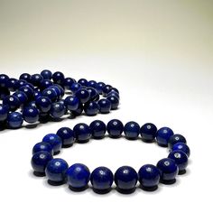 Lapis Lazuli Crystal Bracelet, 10mm Lapis Lazuli Gemstone Beaded Bracelet You will receive 1 (ONE) Lapis Lazuli 10mm Beaded Bracelet like the item pictured.  Great for mixing and matching with other regular bracelets. Lapis Lazuli is a deep blue gemstone that is believed to have powerful metaphysical properties. It is thought to be a stone of wisdom, truth, and inner vision. Lapis Lazuli is said to enhance intellectual ability, promote spiritual growth, and encourage self-awareness. It is also b Polished Beads Lapis Lazuli Bracelets, Polished Beads Lapis Lazuli Round Bracelets, Round Lapis Lazuli Bracelets With Polished Beads, Lapis Lazuli Beaded Bracelets With Polished Round Beads, Lapis Lazuli Crystal, Lapis Lazuli Gemstone, Hippie Bracelets, Gemstone Beaded Bracelets, Tie Styles