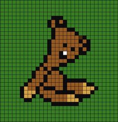 a pixellated image of a teddy bear sitting on the ground with its paws crossed