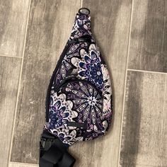 Beautiful Floral Mini Sling Back Pack, Never Worn! New Without Tags. Dimensions: 7.0" W X 13.5" H X 2.5" D With 32.5" Adjustable Strap And 10.5" Adjustable Strap Trendy Purple Shoulder Bag With Cell Phone Pocket, Casual Purple Shoulder Bag For School, Purple Shoulder Backpack For Daily Use, Functional Purple Shoulder Bag With Zipper Closure, Functional Purple Shoulder Bag For School, Trendy Purple Shoulder Backpack, Purple Backpack With Removable Pouch For Daily Use, Purple School Bag With Cell Phone Pocket, Casual Purple Backpack For Daily Use