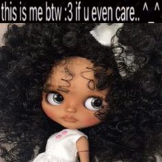 an image of a doll with big eyes and curly hair on it's head