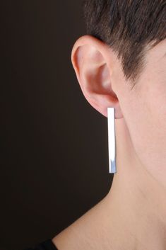 Geometric Long Earrings: Minimalist Architectural Jewelry for her As a line, as a simple gesture. So are the sterling silver rectangular earrings. So minimalist and geometric that they don't need any explanation. Choose the best look (the one you know always suits you), and wear the earrings that favor you. The earrings that accompaing without disguising because they are like you. The silver rectangular earrings are designed and manufactured by me. All the parts, (the rectangle, the stick and th Architectural Earrings, Contemporary Silver Earrings, Long Bar Earrings, Architectural Jewelry, Rectangular Earrings, Edgy Earrings, Large Statement Earrings, Silver Statement Earrings, Abstract Earrings