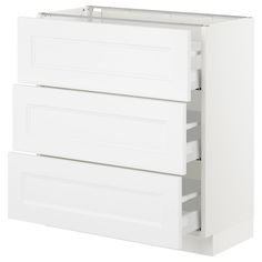 a white kitchen cabinet with three drawers