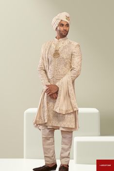 Make a Grand Statement on Your Special Day This Sherwani Design is available in two colours: Cream/Beige (1st Pic) & Rose Gold. Choose as per your liking. Step into luxury with a Handmade Sherwani / Achkan crafted from premium soft blended silk, velvet and cotton blends in a stunning Cream / Gold colour, offering both comfort and sophistication. Our diverse collection features designs to suit every taste: Classic Elegance: Choose a timeless Sherwani with intricate embroidery on the collar or cuf Traditional Nehru Jacket For Wedding And Eid, Festive Wedding Nehru Jacket With Dupatta, Jamawar Nehru Jacket For Wedding, Wedding Nehru Jacket In Jamawar For Transitional Season, Traditional Nehru Jacket For Wedding And Festive Occasions, Festive Jamawar Nehru Jacket For Wedding, Festive Wedding Traditional Nehru Jacket, Transitional Wedding Nehru Jacket In Jamawar, Sherwani With Pallu For Eid Reception