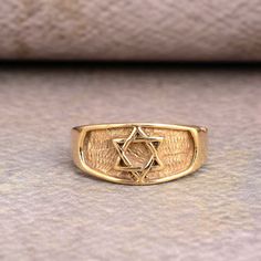 Gold Star Ring, Star of David Ring, Jewish Star Ring, Vintage Ring, Magen David Ring, Protective Amulet Ring, Personalized Gift 1. Please share your numbers (in personalization box ) as required for shipping address details, and it'll help us to contact you easily. And don't worry about the privacy, we'll keep it safe with us, So try to cooperate with us. :) 2.Customers' satisfaction is our biggest priority, please contact us with any questions/queries for future or existing orders, and we will do our best to make sure you are happy with your order. 3.Please make sure to add the correct address during checkout. You can return your purchased item within 15 days after successful delivery. We offer a 100% "Money Back Guarantee" if you are not satisfied with your purchase. Return charges will David Ring, Protective Amulet, Mothers Day Rings, Judaica Jewelry, Jewish Star, Sacred Symbols, Star Gift, Etsy Personalized Gifts, Star Ring