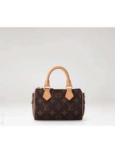 Gender: Women Brand: LOUIS VUITTON Product Name: Nano Speedy Monogram Tote Bag Brown Bags Alora Code: 79958012 Color: brown Origin: France Designer Style ID M81085 High-end Brown Satchel With Gold-tone Hardware, Brown Monogram Canvas Satchel With Top Carry Handle, Brown Monogram Canvas Satchel With Top Handle, Brown Monogram Canvas Bag With Top Carry Handle, Brown Monogram Canvas Satchel For Business, Brown Monogram Canvas Shoulder Bag With Top Handle, Brown Monogram Canvas Business Bag, Luxury Brown Crossbody Satchel, Luxury Brown Satchel