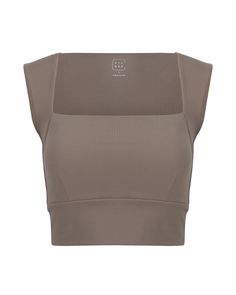 DETAILS: Color: Mocha Nylora's signature 4-way stretch fabric Built-in bra with removable padding Square neckline 77% Nylon, 23% Spandex Machine wash SIZE & FIT: Fits true to size Length: 14 3/4" Bust: 14" Bottom: 12 1/4" Brown Stretch Crop Top With Built-in Bra, Fitted Seamless Brown Sports Bra, Fitted Brown Seamless Sports Bra, Fitted Nylon Seamless Sports Bra, Solid Seamless Fitted Sports Bra, Solid Color Seamless Fitted Sports Bra, Fitted Nylon Sports Bra With Seamless Design, Fitted Seamless Nylon Sports Bra, Fitted Brown Sports Bra For Gym