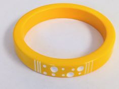 Vintage Yellow Polka Dot Carved Celluloid Bangle/ Bracelet MCM Vintage Yellow Round Bracelets, Retro Yellow Adjustable Bracelets, Retro Yellow Bangle Bracelet, Retro Yellow Bangle Bracelets, Yellow Retro Bracelet As Gift, Lucite Bracelets, Black Evening Bag, Crochet Clutch, Butter Yellow