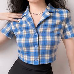 "Get your 90s babe style on with our Colette Lapel Plaid Top! This top features a front lapel collar and super cute plaid prints, perfect for pairing with our Cara skirts. Made from Viscose, it's available in Purple and Blue. Cold hand wash and cool iron recommended. Check out the fabric swatch for the most accurate color representation. #90sFashion #PlaidTop #Viscose #CaraSkirts" Plaid Collared Top With Preppy Style, Preppy Collared Plaid Tops, Preppy Fitted Plaid Top, Preppy Plaid Collared Top, Retro Plaid Collared Tops, Cara Skirt, Color Representation, Crochet Tank Top, Fabric Swatch