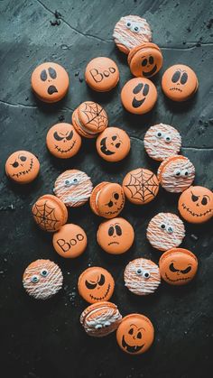 pumpkins with faces drawn on them are arranged in a circle and have been decorated to look like jack - o'- lanterns