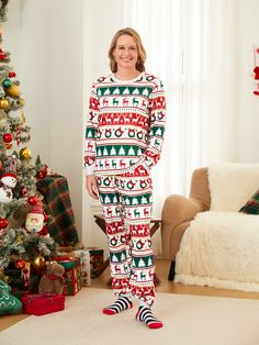 Create unforgettable family memories with our Christmas-themed matching outfits for the whole family.
* Please add each size separately to your shopping cart.
* Piece of product: Each size includes 1 set of pajamas, 1 romper, or 1 pet bandana.
* For children's safety, pajamas should be snug-fitting or flame-resistant. These kids' and babies' pajamas are flame-resistant.
* Product features: Christmas tree, reindeer, and wreath designs 
* Fabric characteristics: Soft and comfortable pajamas 
* Neckline: Crew neck 
* Sleeves: Long sleeves 
* Style: Matching family Christmas pajamas 
* Fit: Regular fit 
* Length: Moderate length 
* Source of goods: Imported 
* Supplier: PatPat Family Christmas Pajama Set, Xmas Tree Pattern, Pjs For Women, Christmas Pajamas Family, Matching Family Christmas Pajamas, Matching Christmas Pajamas, Comfortable Pajamas, Christmas Pajama Set, Christmas Pjs