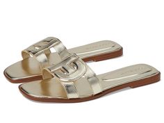 Cole Haan Chrisee Sandals - Women's Sandals : Soft Gold Leather : Experience ultimate comfort showcasing fashion with every step in these slip-on style Cole Haan Chrisee Sandals with smooth salpa welt and cushioned interlocking Iconic CH logo strap detail. These flats feature a slightly square-toe silhouette, lightly padded textile upper and lining, and rubber insole to delight you with comfort while providing superior styling. Boasts patented FlowerFoam rubber outsole for flexibility, traction, and comfort. Imported. Measurements: Heel Height: 1 2 in Weight: 5.3 oz Product measurements were taken using size 7, width B - Medium. Please note that measurements may vary by size. Cole Haan Women, Fashion Sandals, Sandals Women, Kids Luggage, Gold Leather, Pharmacy Gifts, Women's Sandals, Cole Haan, Flat Sandals