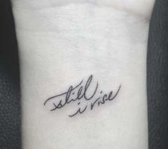 a small wrist tattoo with the words still in wise on it