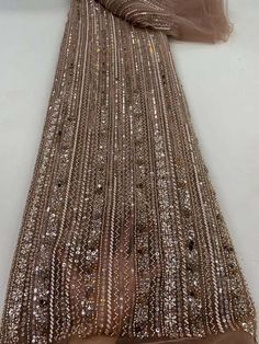 This high quality Fabric is measured in 5 Yards With Embroidered Beading and Sequin. It is soft, very delicate and beautiful. This high Quality Fabric is made with Fashion embroidered rhinestones can be used in making party wedding dresses, skirts, shawls, scarves and other other fashion apparels as you would like. Size : Length : 5 yards (180 inch). Width: 50 inch (Please allow slight deviation for the measurement data ,±1 inch) Material: 100% Polyester, Tulle Lace Fabric, Eco-Friendly embroidery Luxury Fabric, Tulle Lace, Wedding Party Dresses, Luxury Fabrics, Lace Fabric, Party Wedding, Dress Making, Quality Fabric, Designer Dresses