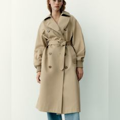 Zara Belted Water Repellent Pleated Trench Coat Size M Nwt Ref| 7522/041 Lapel Collar Trench With Pleated Long Sleeves With Elastic Cuffs. Front Welt Pockets. Back Vent At Hem. Self Belt With Tonal Buckle. Wrap Front With Button And Metal Hook Closure. Outer Shell 52% Cotton 48% Polyester Lining 100% Polyester Items Are Retail Store Purchases And May Have Been Handled Or Tried On By Store Customers Prior To Sending, Photos Are Taken Of Item With Shipping Label And A Zip Tie Tag Attached To Repre Outfit Inspo 2023, Pleated Sleeves, Spring 23, Virtual Wardrobe, Style 2023, Zara Top, Ethical Clothing, Travel In Style, Zara Jackets