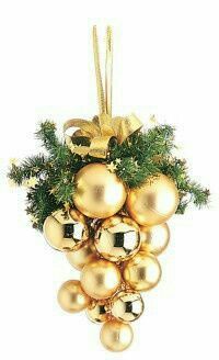 a bunch of gold ornaments hanging from a tree